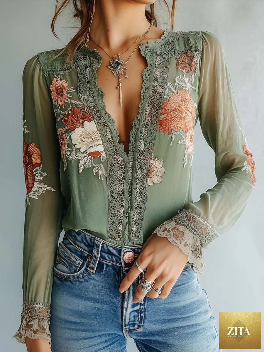 Women’s V-neck floral print blouse by Zita La Belle Elite, casualwear top with colorful blossom pattern and lightweight fabric.