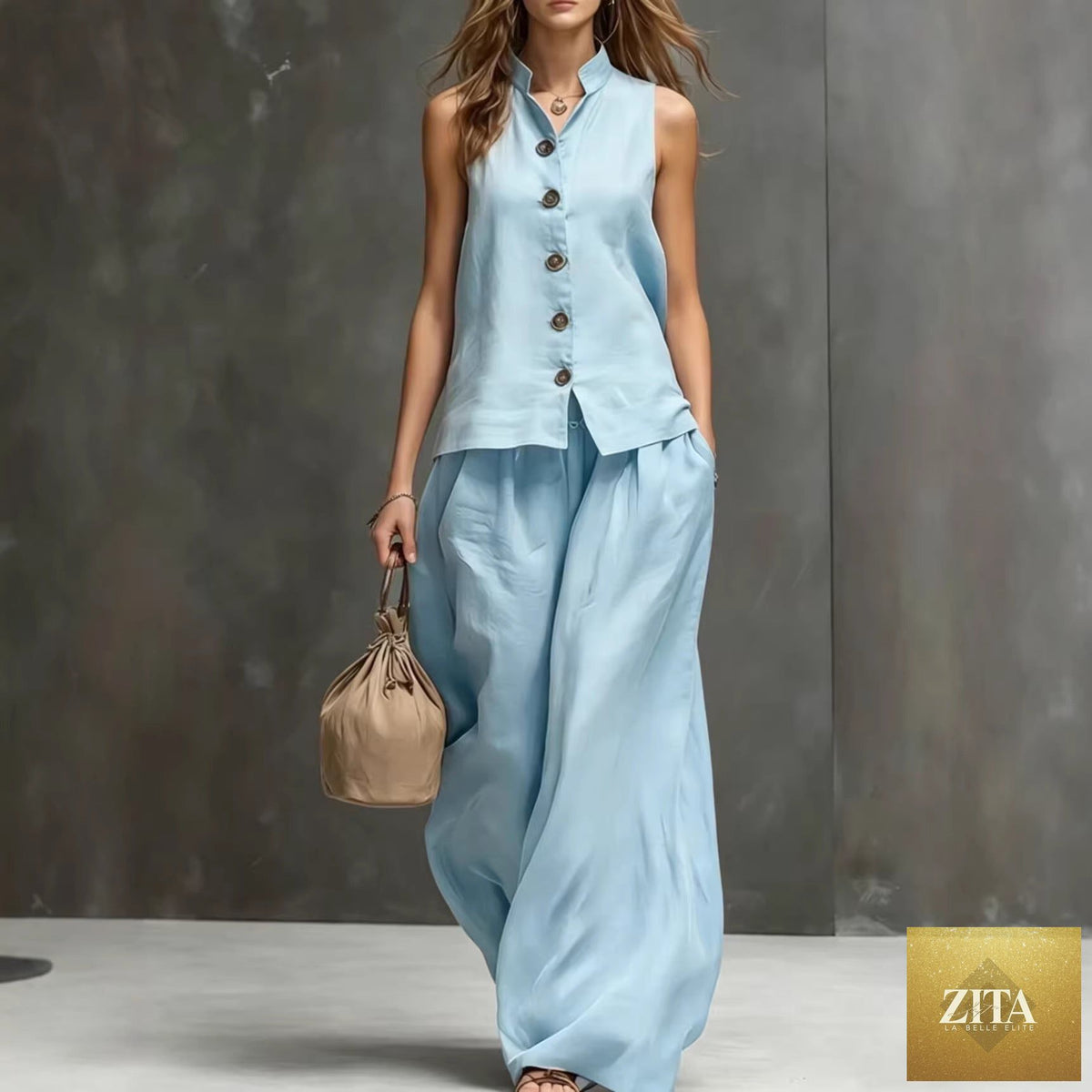 Women's sleeveless vest and wide-leg pants two-piece set by Zita La Belle Elite in cotton linen, shown on a model.