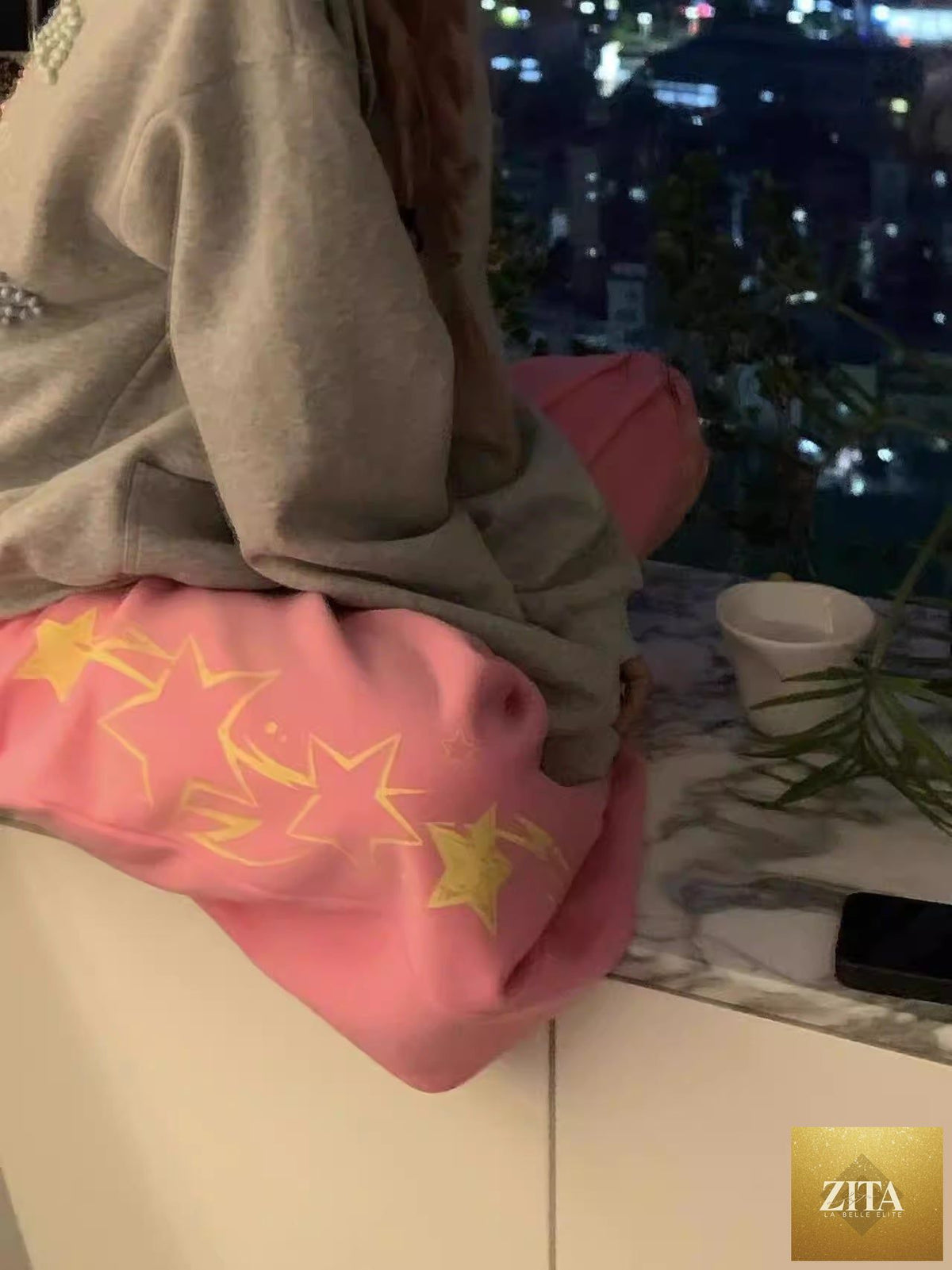 Casual women's pants with retro print letter design and drawstring waist, made from lightweight fabric for comfortable wear.