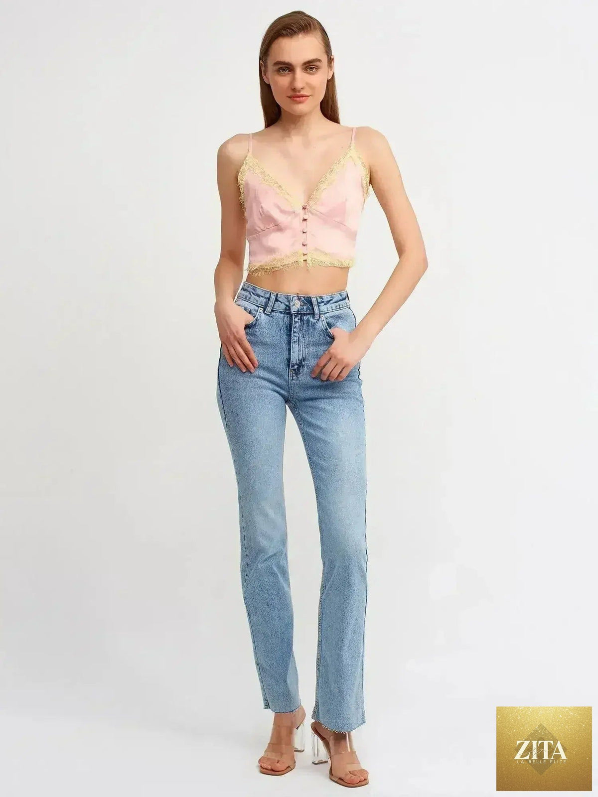Pink lace detail crop top by Femstylo featuring a rayon-viscose blend and feminine style, shown on a model.