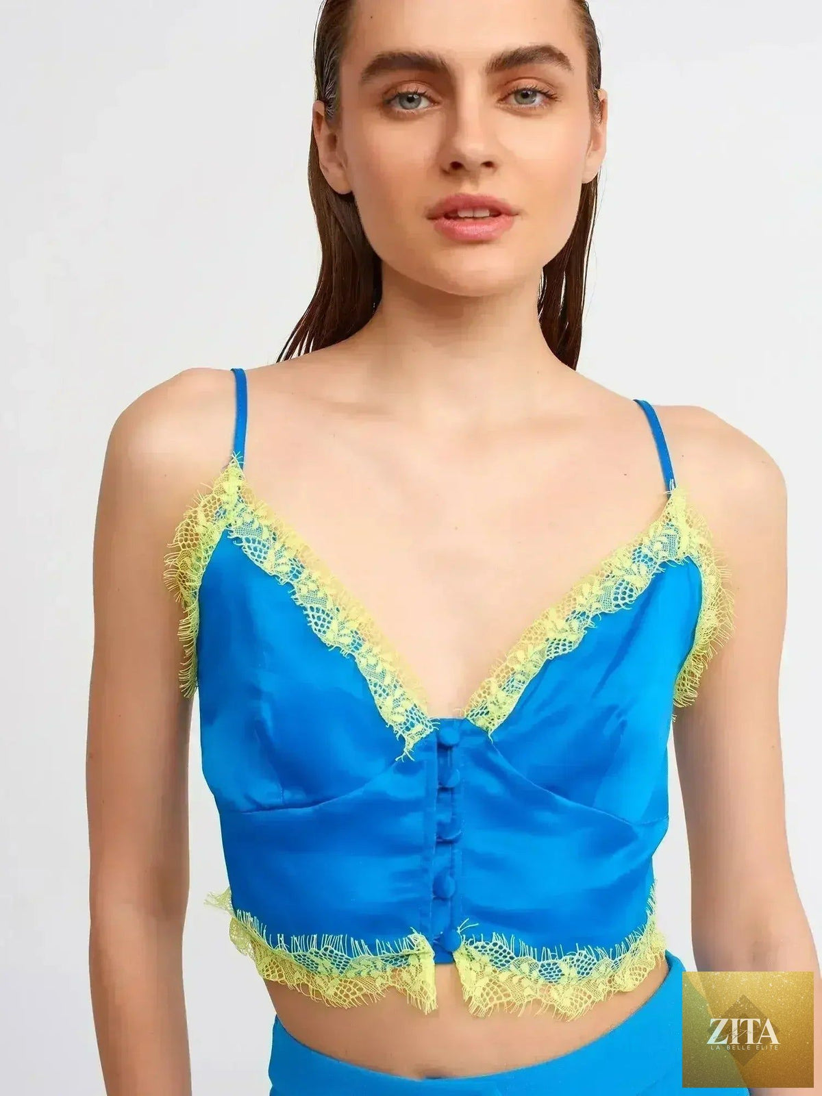 Femstylo lace detail crop top with rayon-viscose blend, featuring feminine style and intricate lace accents.