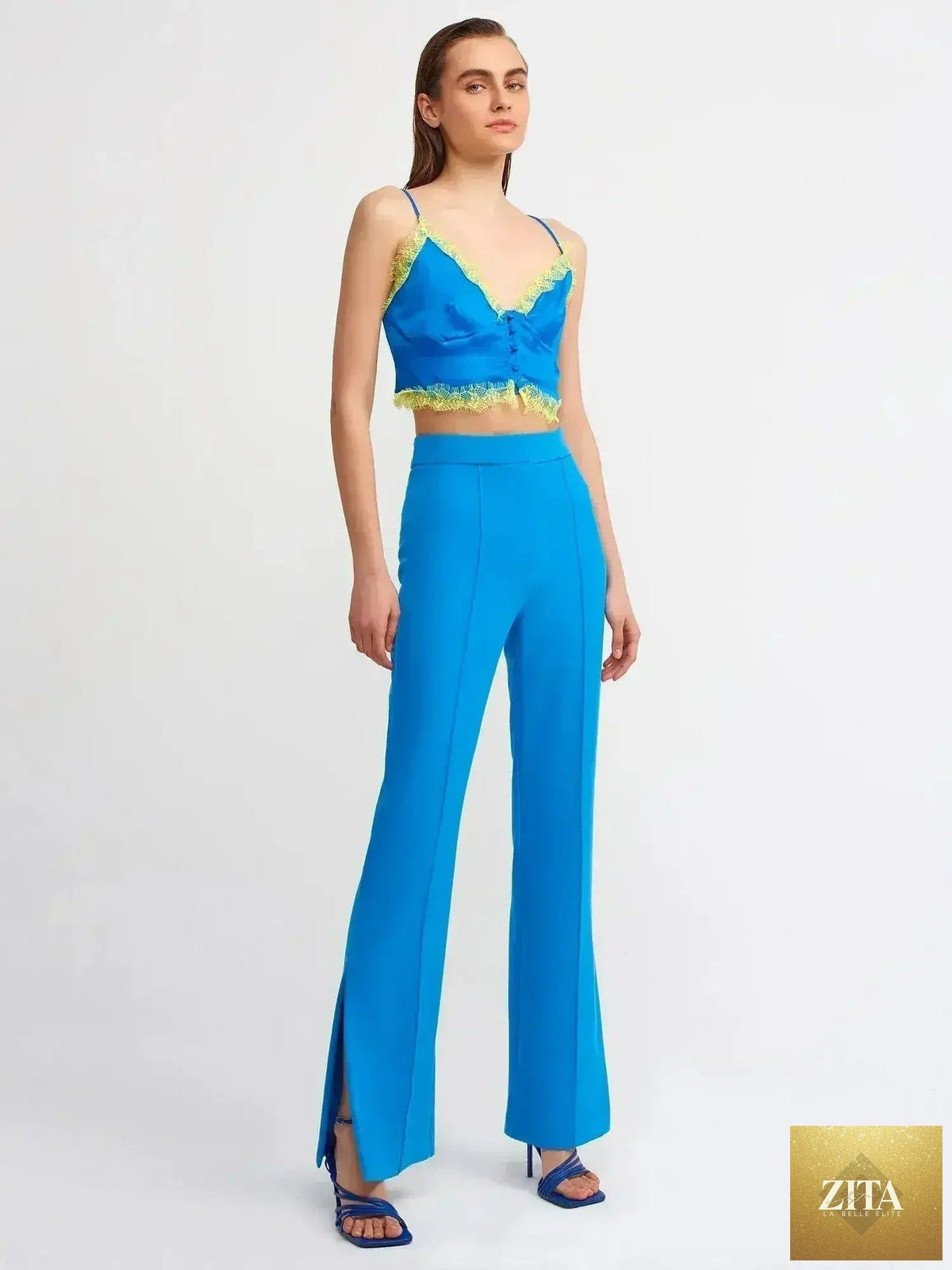 Femstylo lace detail crop top made of rayon-viscose blend, featuring feminine style and delicate lace accents.
