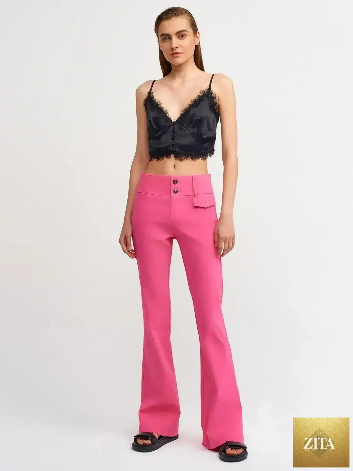Black lace detail crop top by Femstylo featuring a feminine style and rayon-viscose blend fabric.