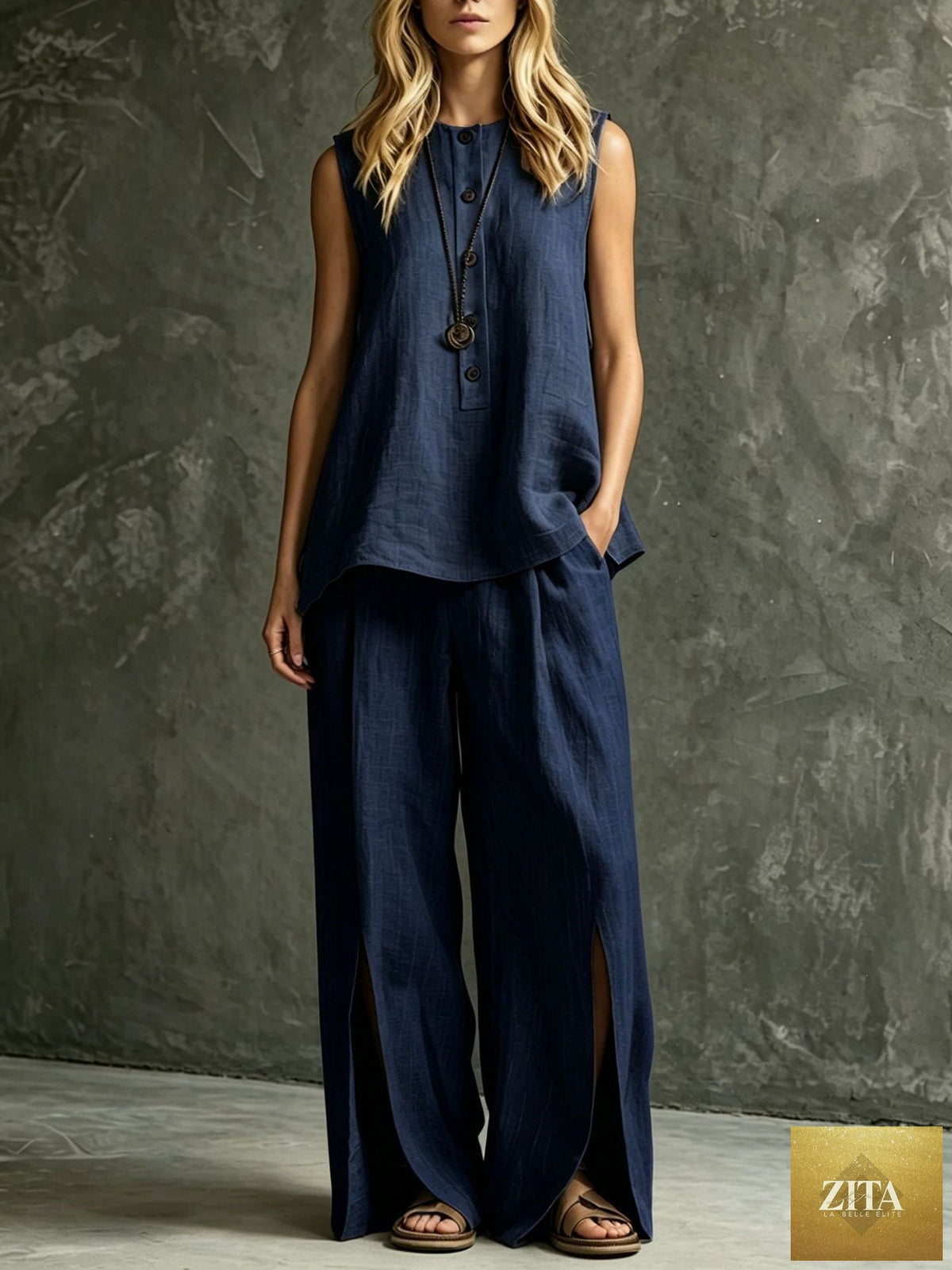 Women's loose sleeveless tank top and slit wide-leg pants two-piece casualwear set by Zita La Belle Elite, shown on a model.