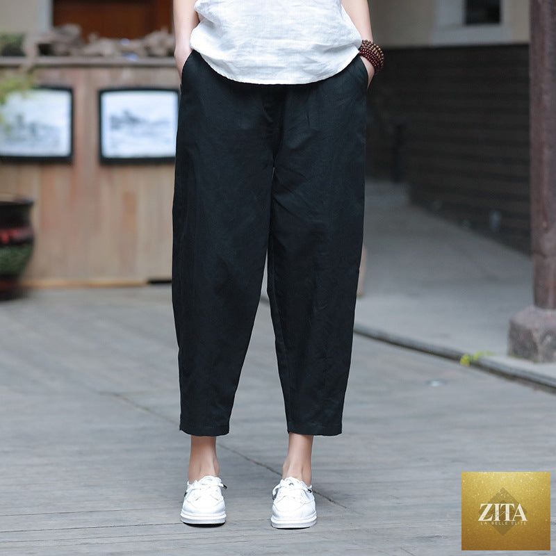 Casual women's cotton linen cropped pants in beige, featuring a loose fit and slim silhouette, perfect for spring and summer wear.