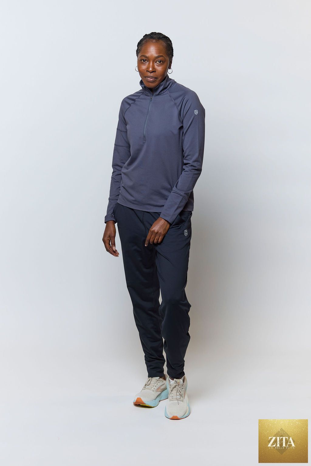 Black Valia women's training jogger pants by Goal Five, shown in a relaxed fit with elastic waistband and tapered legs.