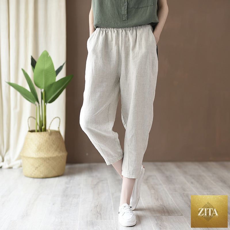 Light beige cotton linen casual pants for women, featuring a slim fit and cropped style, perfect for spring and summer wear.