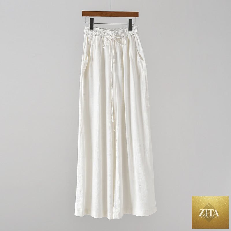 Light blue cotton linen wide-leg yoga pants for women, featuring artistic stone wash design, perfect for spring and summer casual wear.