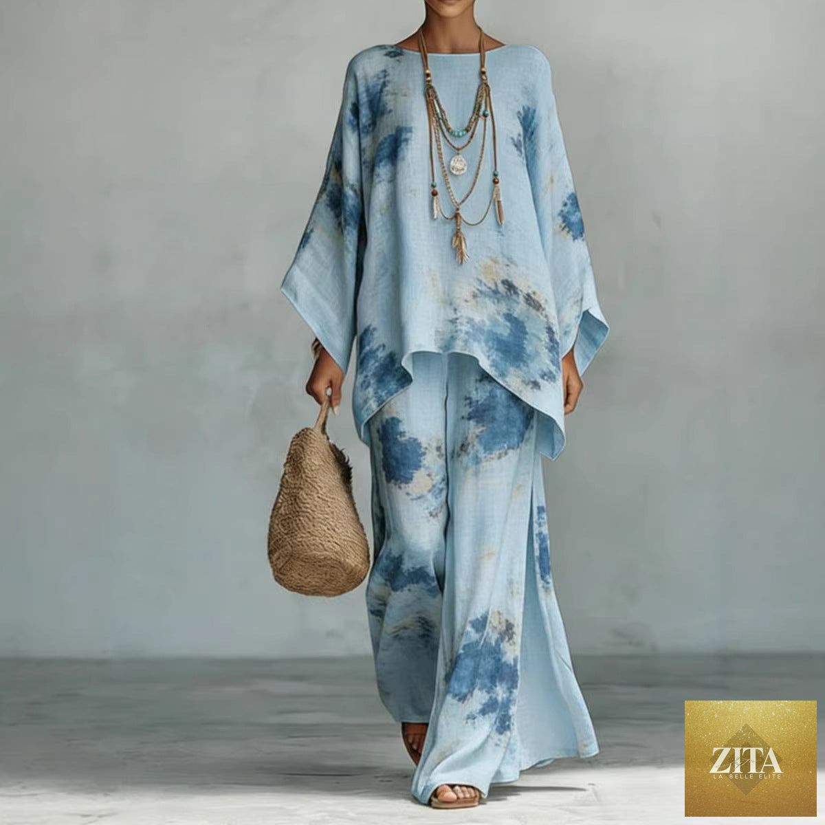 Floral print bamboo linen two-piece set with wide-leg pants by Zita La Belle Elite, featuring a matching top and relaxed fit.