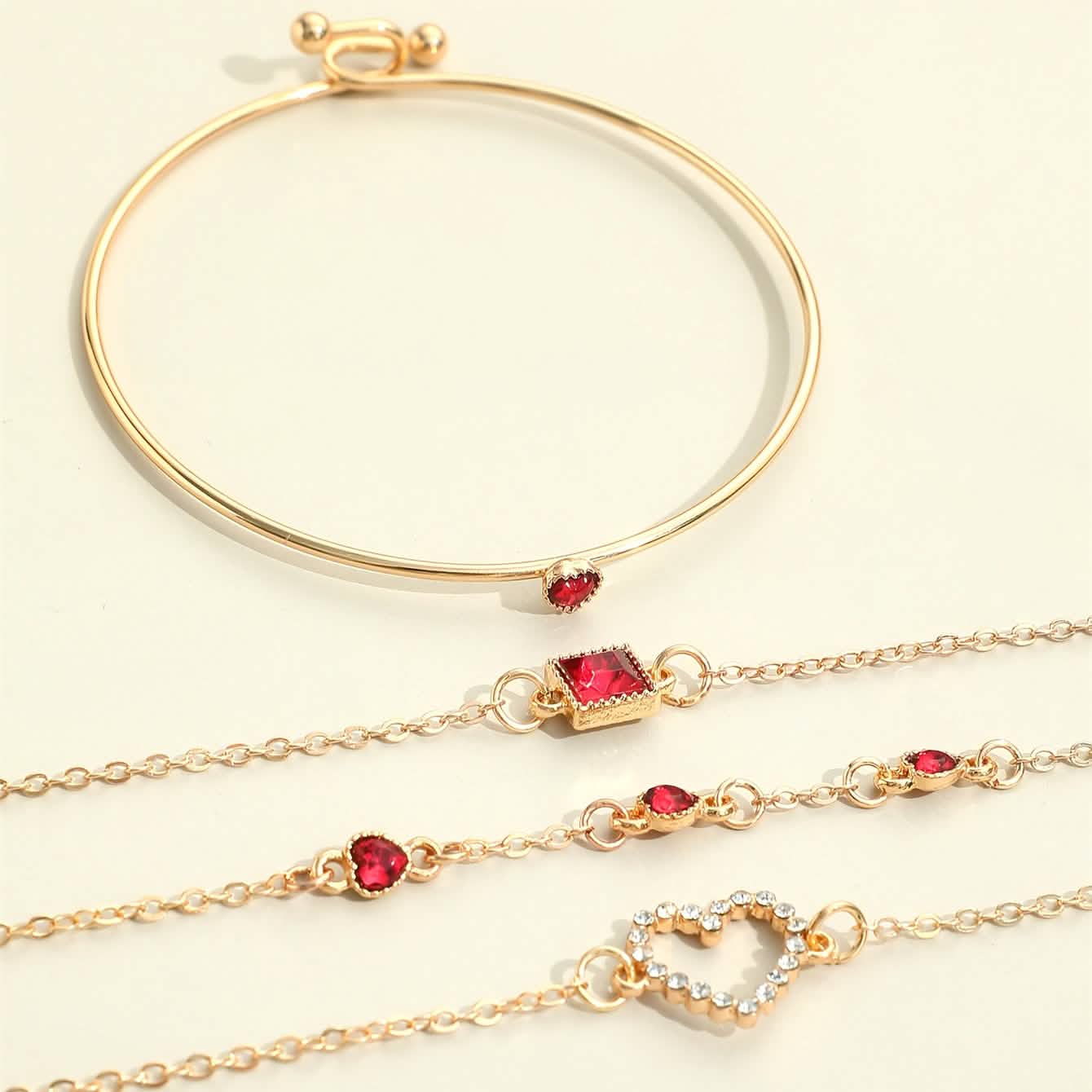 Set of 4 rhinestone alloy bracelets with minimalist heart and square designs, ideal for stylish jewelry accessories.