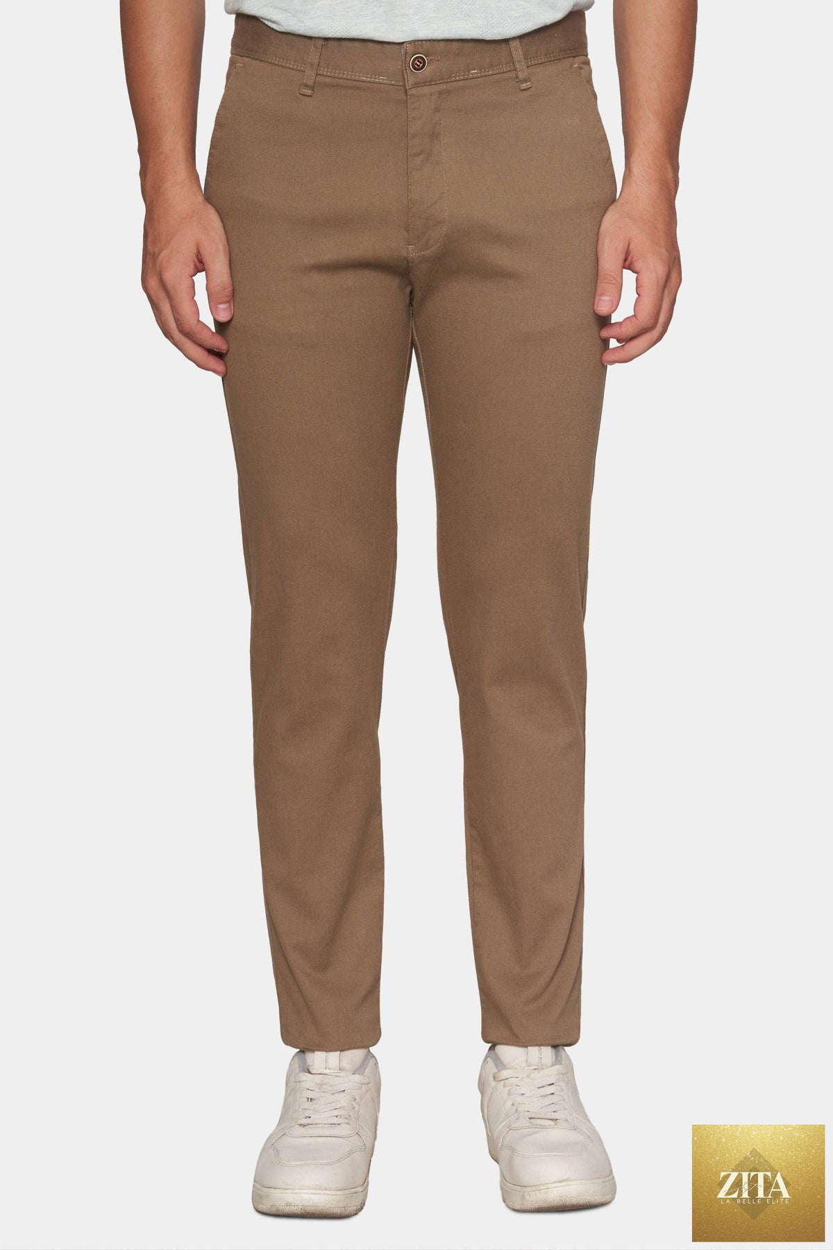 Bright Moons The Timeless Chino in original tan, showcasing classic fit and durable cotton fabric on a well-pressed pair of chinos.