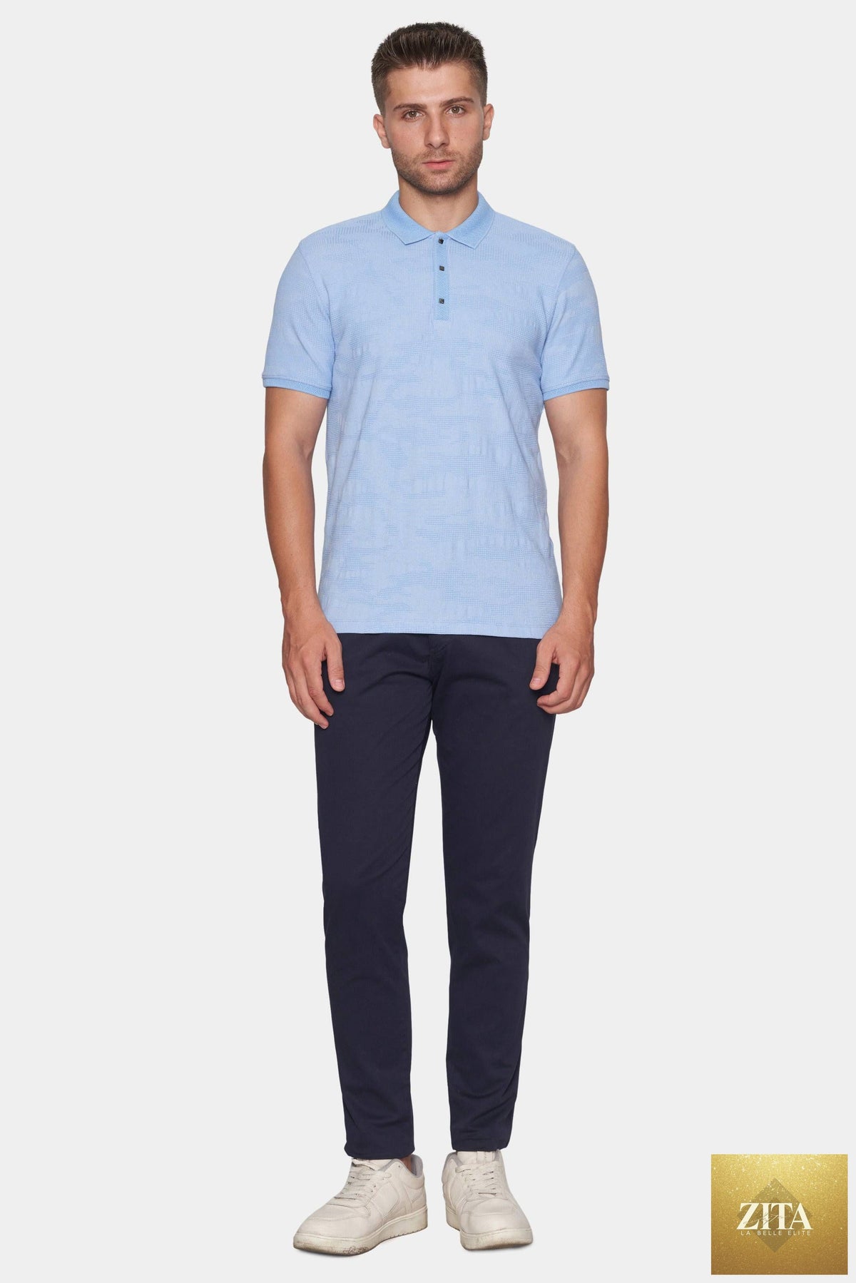 Dark navy Bright Moons Timeless Chino pants, close-up view showing fabric texture and classic fit details.