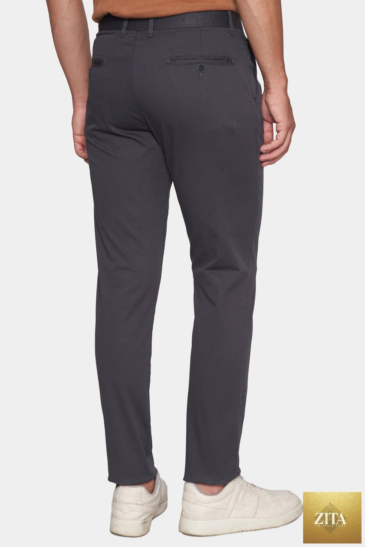 Dark charcoal Bright Moons Timeless Chino pants displayed on a hanger, showcasing classic fit and fabric texture.