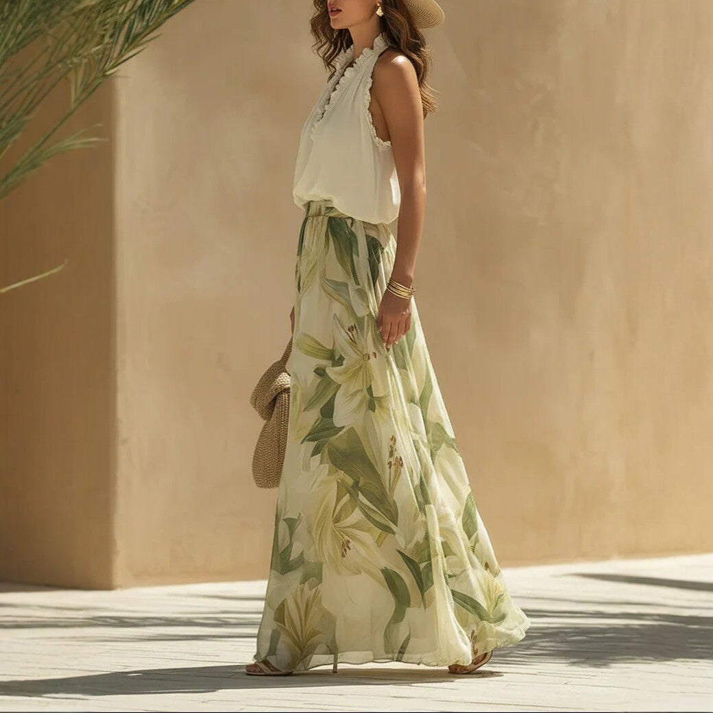 Casual waist-cinching printed maxi dress with ruffle hem from FitiqueFit, available in sizes S to 3XL, featuring a vibrant floral pattern.