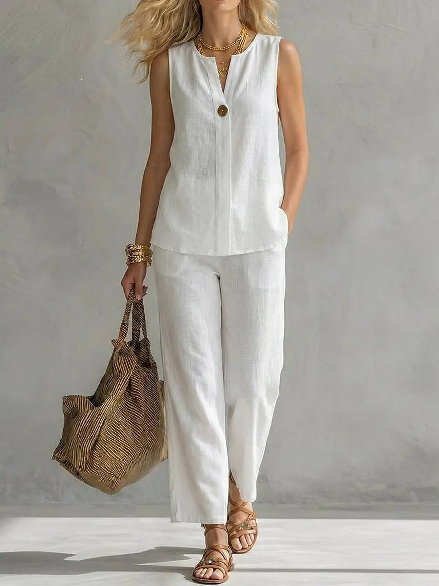 Women's casual sleeveless V-neck top and full-length pants two-piece set by FitiqueFit, featuring comfortable, stylish fabric and fit.