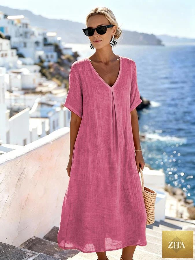 Patchwork asymmetrical maxi dress by FitiqueFit featuring a relaxed V-neck style and flowing, multicolored fabric design.