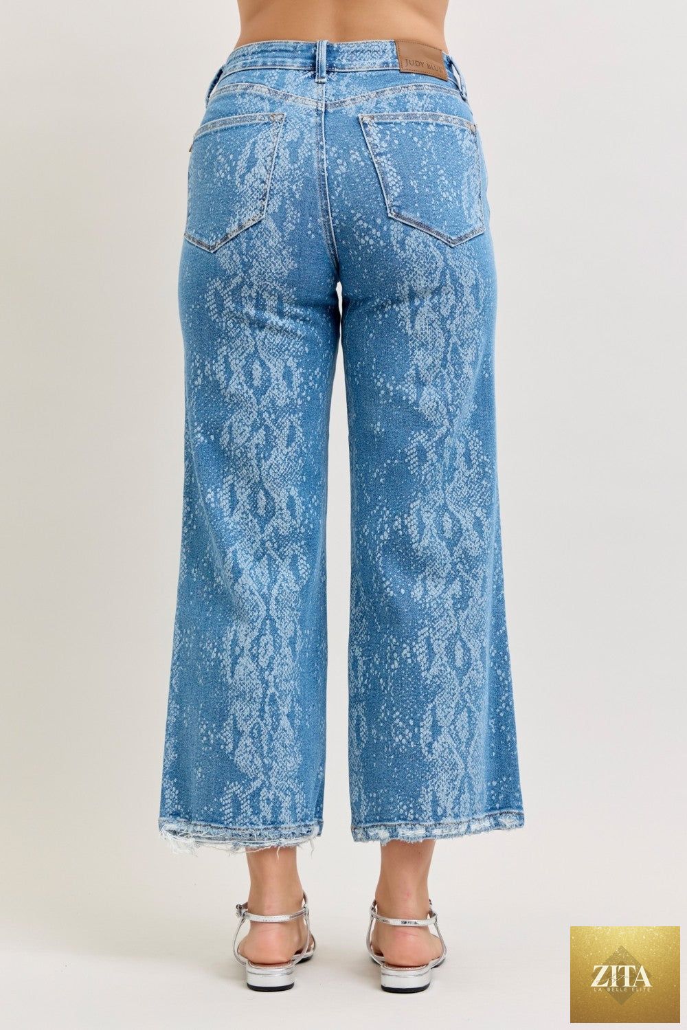Wild and Free Boutique Judy Blue high-rise ankle wide-leg jeans showing a light wash denim with a relaxed fit and cropped length.
