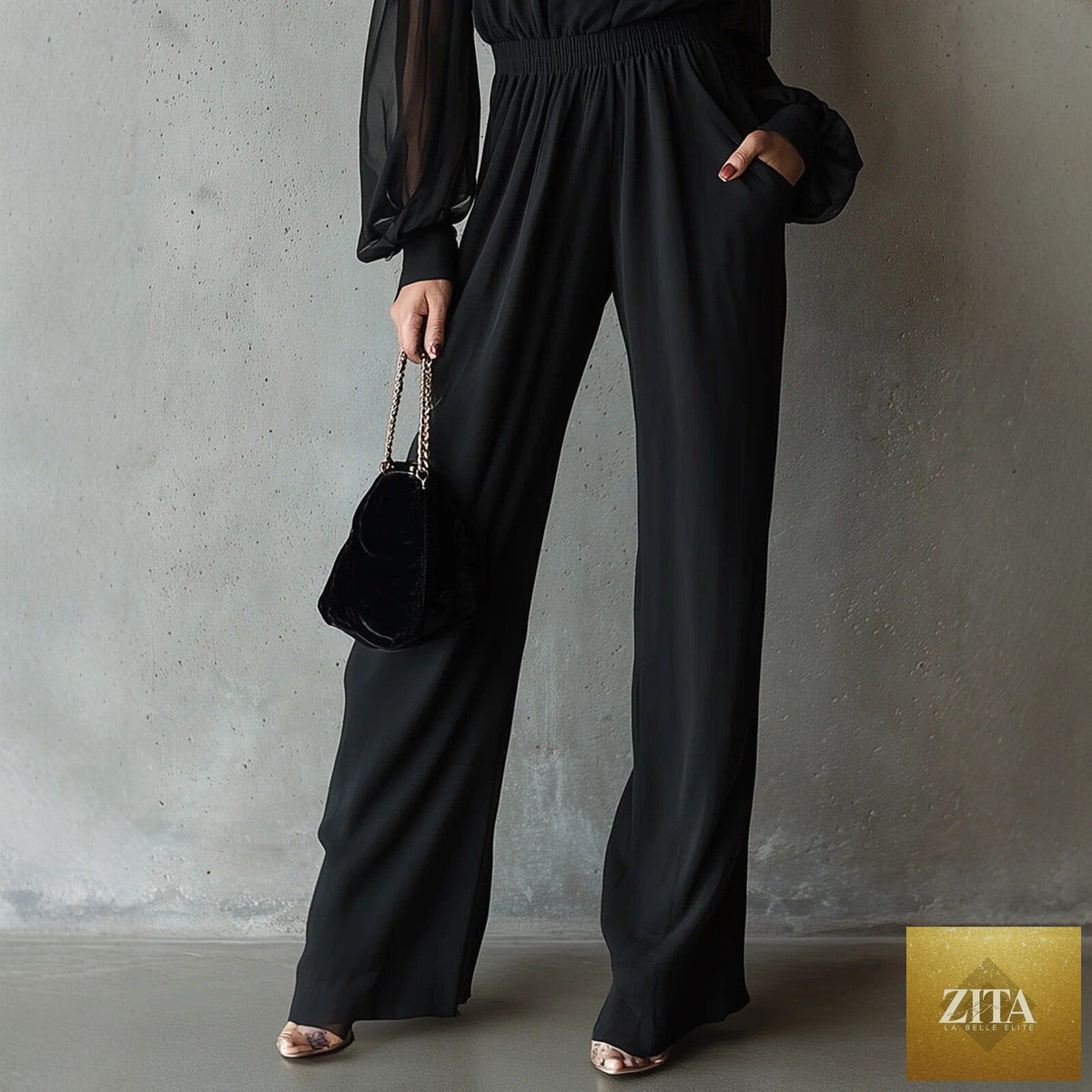 Black embroidered women’s long-sleeve wide-leg jumpsuit by Zita La Belle Elite, featuring casual style and comfortable fit.