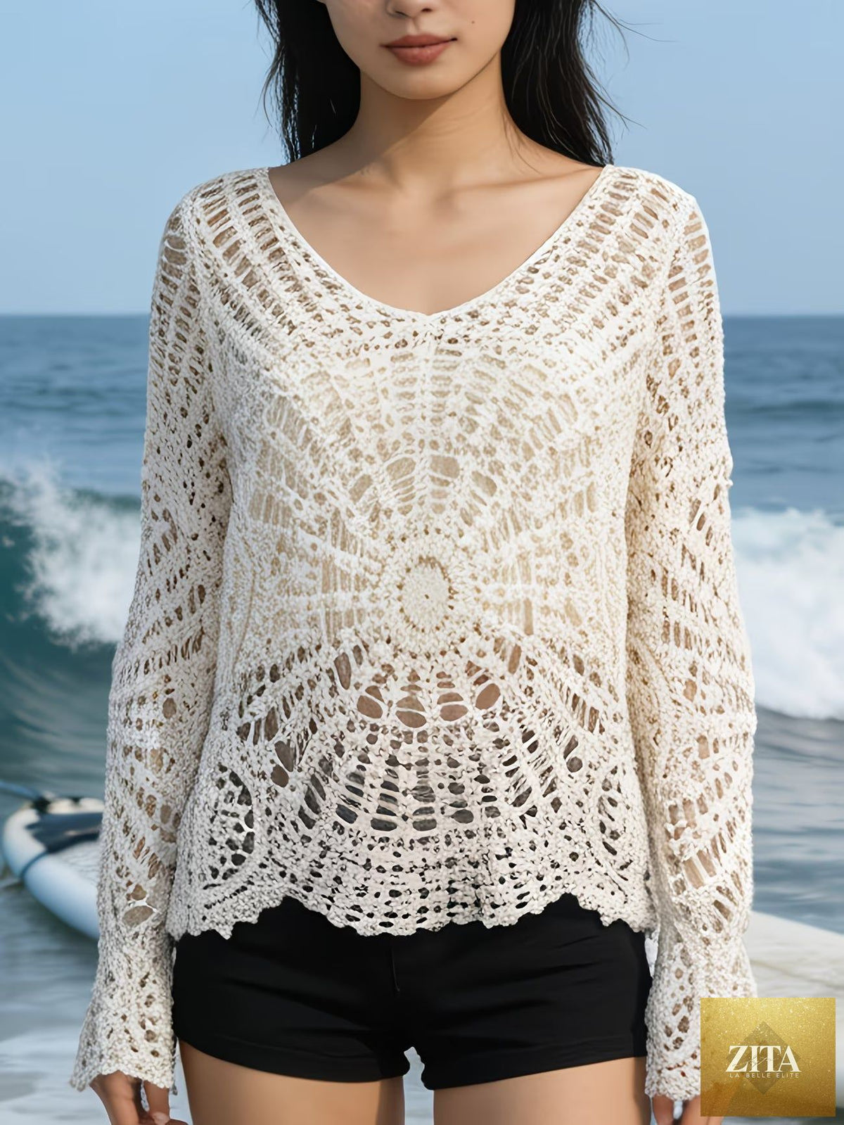 Women’s summer openwork lace knit long sleeve cover-up top, sun protective and stylish for warm weather.