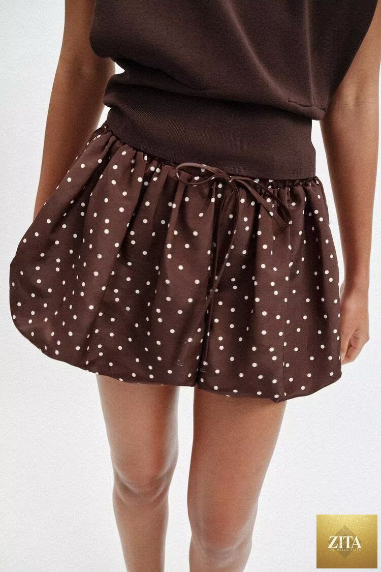 Women’s summer elastic high waist polka dot mini skirt, retro style, versatile for all occasions, from Wanita Store.