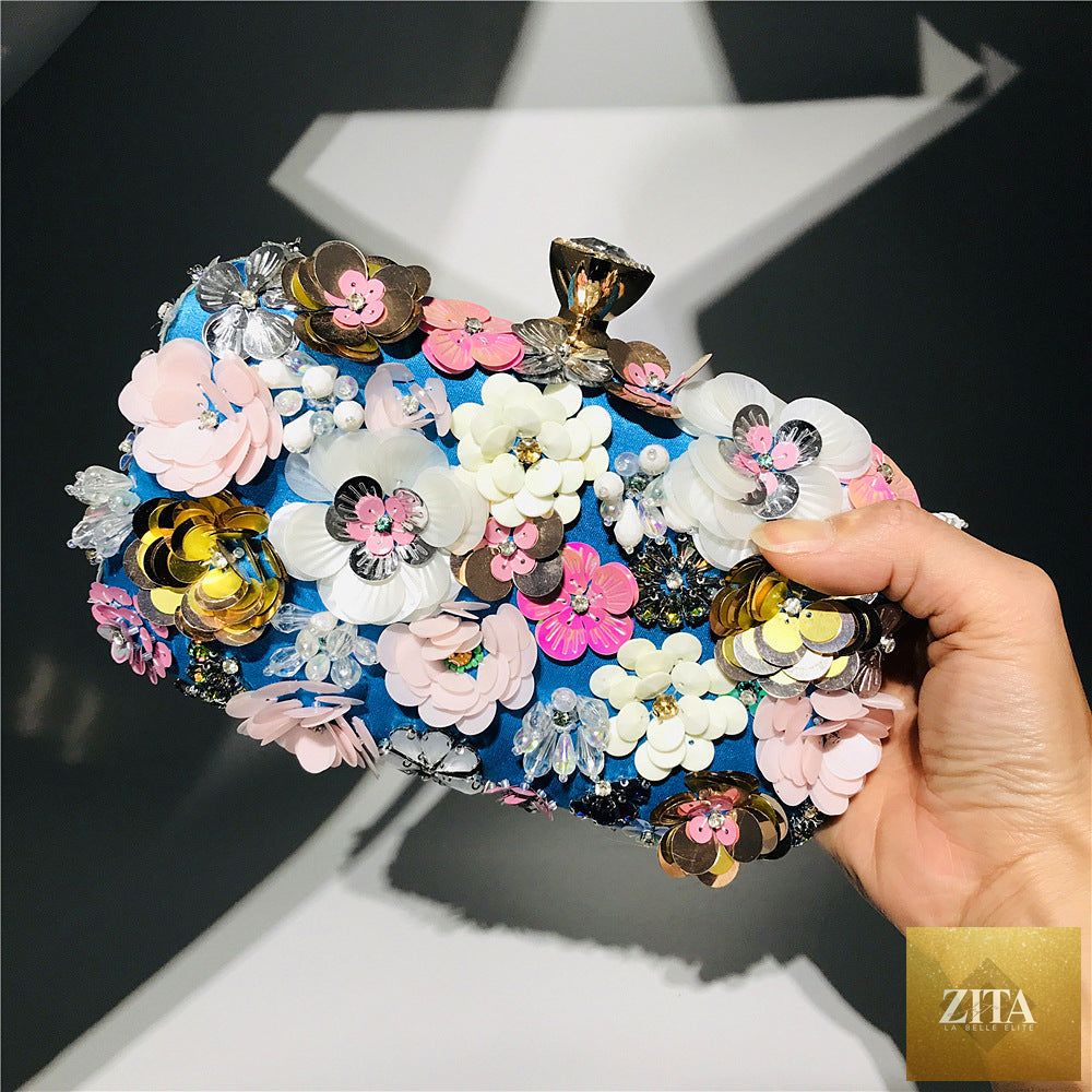 Colorful floral clutch purse for women, evening bag with vibrant floral design, ideal for formal parties and events.