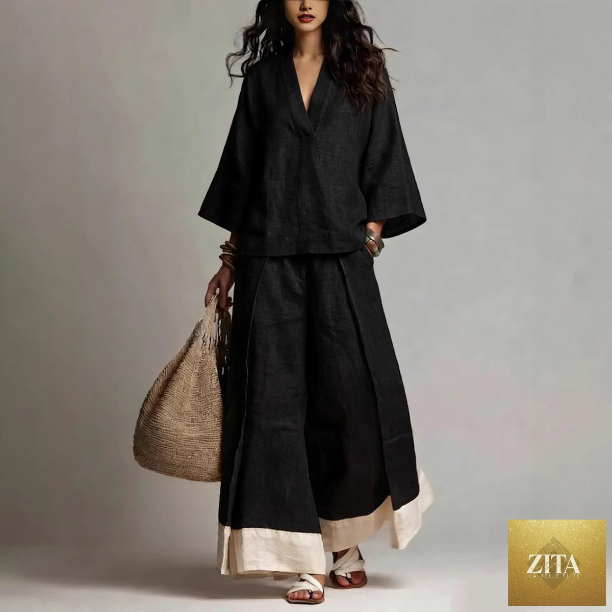 Women's cotton-linen V-neck 3/4 sleeve shirt and wide-leg pants set by FitiqueFit, shown in a relaxed, stylish outfit.
