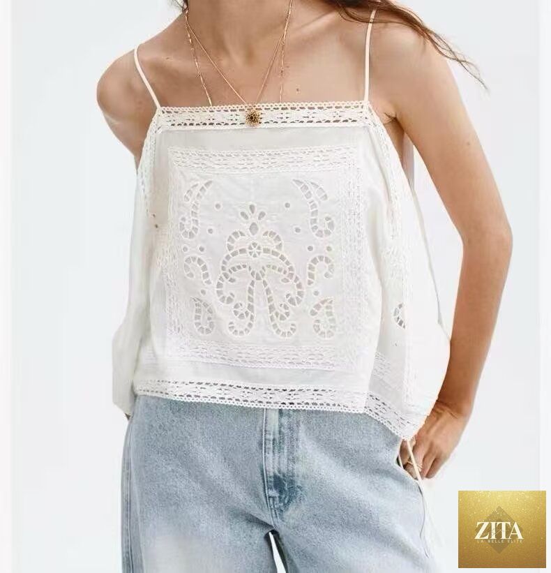 Bella Mia solid color summer camisole with cutout embroidery and hollow out design, lightweight and stylish for warm weather.