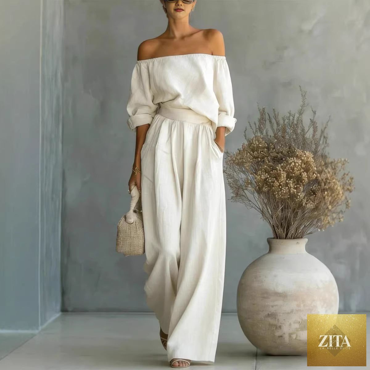 Women's casual off-shoulder long-sleeve top and wide-leg pants two-piece set by Zita La Belle Elite, styled for everyday wear.