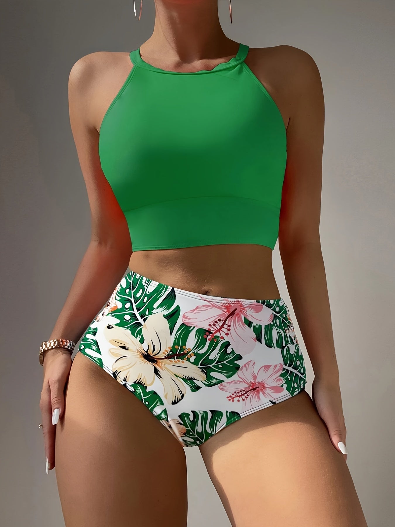 Stevvex Island Bloom high-waist bikini set with tropical print, colorblock design, round neckline, and applique detail for summer swimwear.