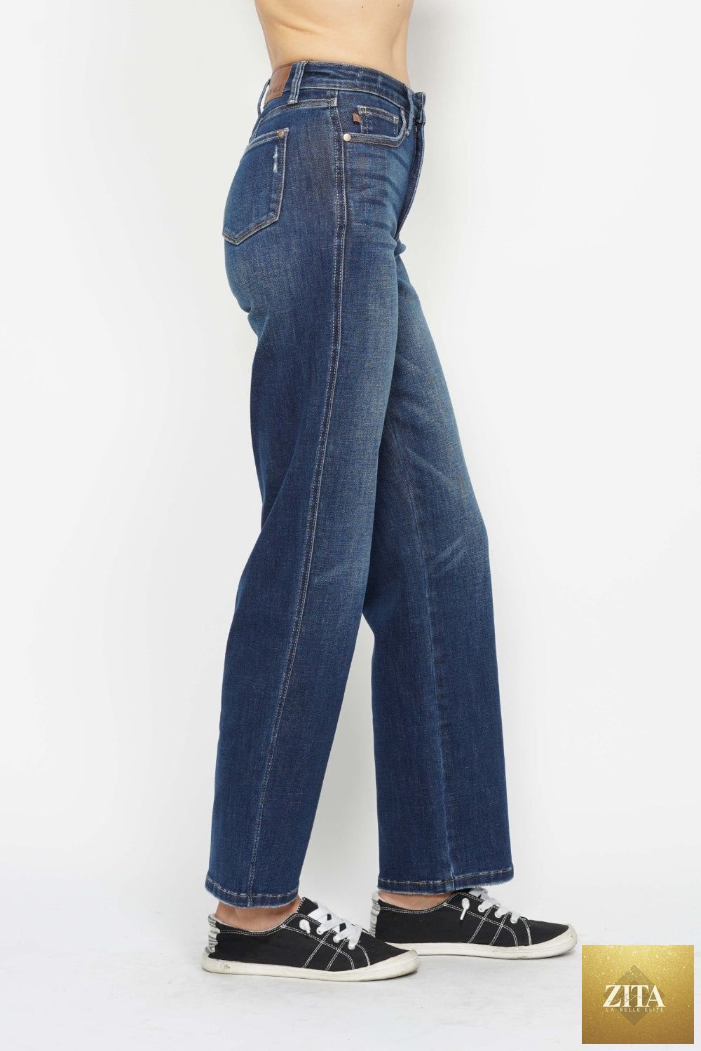Wild and Free Boutique Judy Blue full size high waist tummy control jeans, showcasing the fit and denim texture.