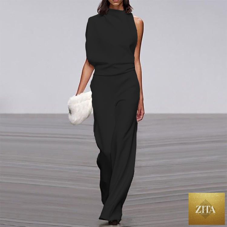 Solid color one-shoulder jumpsuit with a pile collar, featuring a stylish and modern design perfect for fashionable occasions.