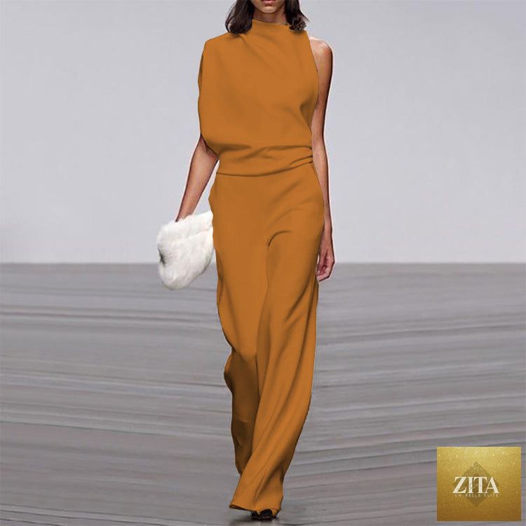 Solid color one-shoulder jumpsuit with a pile collar, featuring a stylish design and tailored fit, perfect for modern fashion.