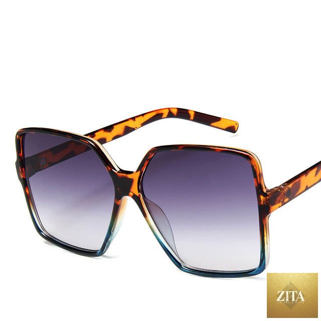 Vintage big frame sunglasses from FitiqueFit with UV400 protection, stylish fashion shades with dark lenses and bold frames.