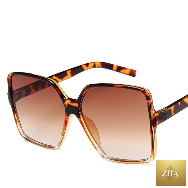Vintage big frame sunglasses from FitiqueFit with UV400 protection, fashionable eye wear for a stylish look.