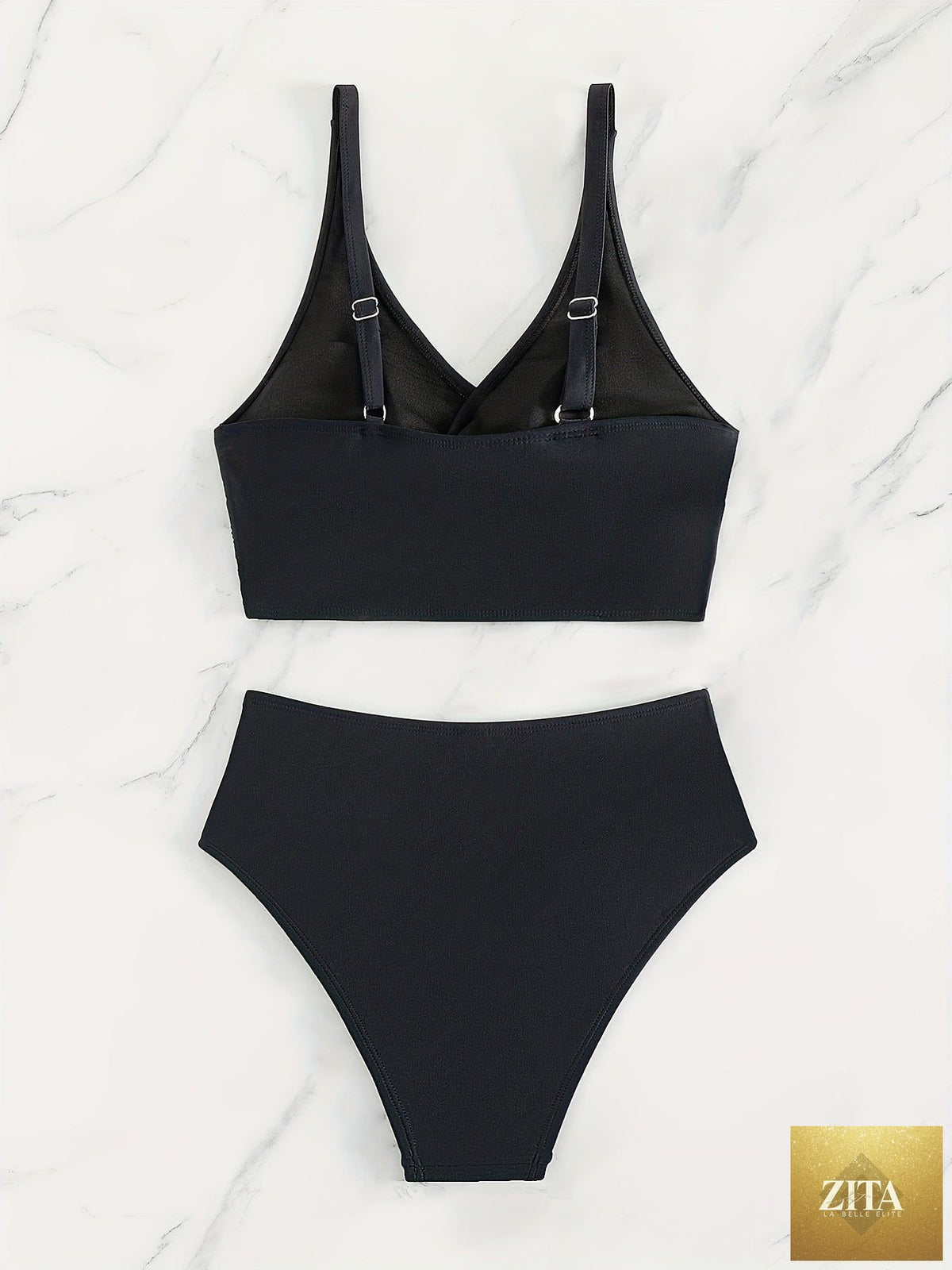 Black Stevvex bikini set with twist front, high waist, V neckline, ruched tummy control, and cross strap detail for beach and pool.