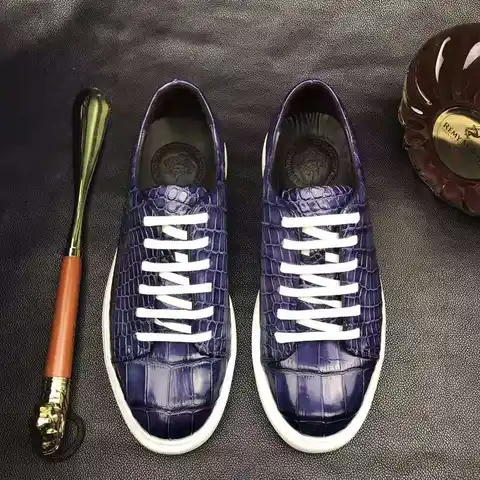 Handmade men's crocodile leather sneakers by Don John, featuring stylish design and premium craftsmanship.
