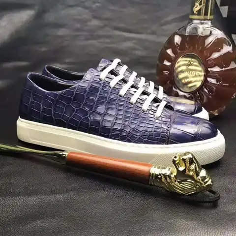 Handmade men's Don John Crocodile Sneakers with textured crocodile pattern and casual lace-up design.