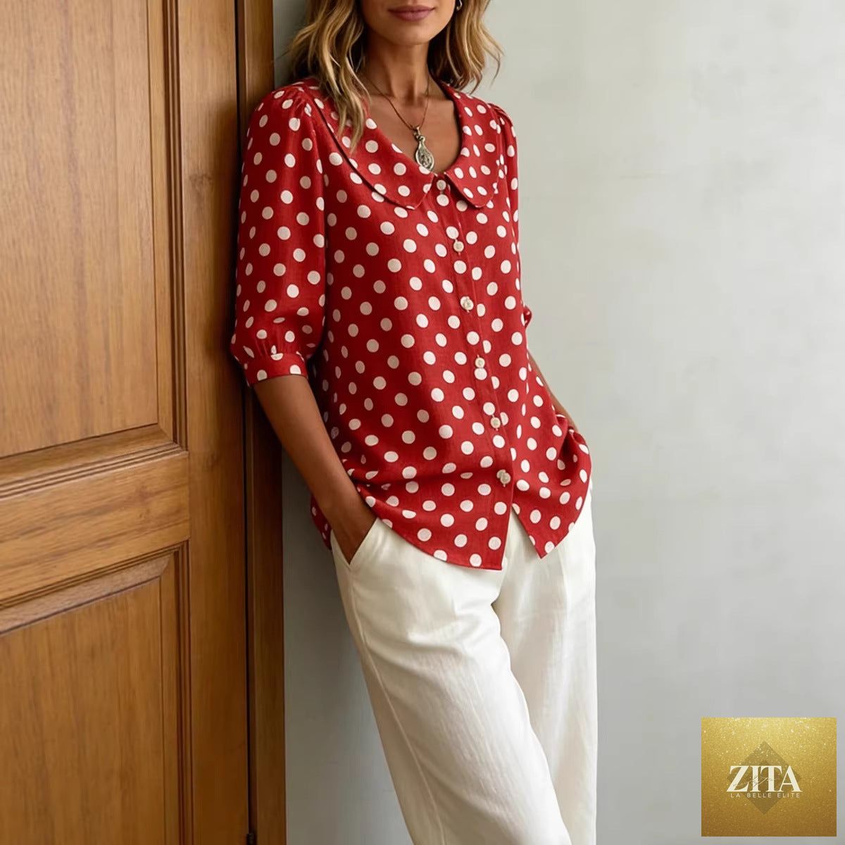 Women's retro polka dot three-quarter sleeve loose cardigan by Zita La Belle Elite, featuring a casual, vintage-inspired design.