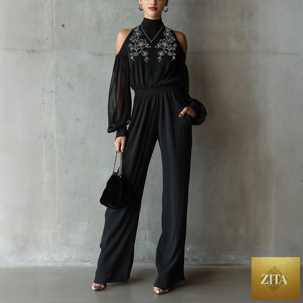 Black embroidered women’s long-sleeve wide-leg jumpsuit by Zita La Belle Elite, casualwear with intricate embroidery details.