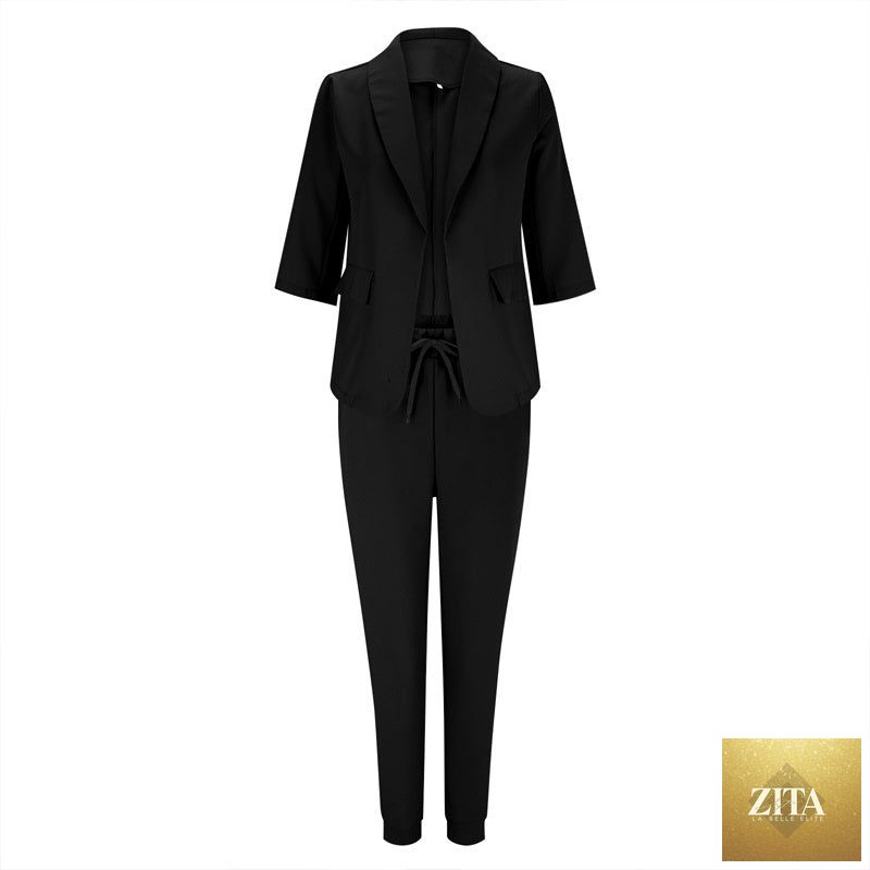 Women’s casualwear blazer and drawstring pants suit set by FitiqueFit, featuring a notch-lapel blazer and relaxed matching pants.