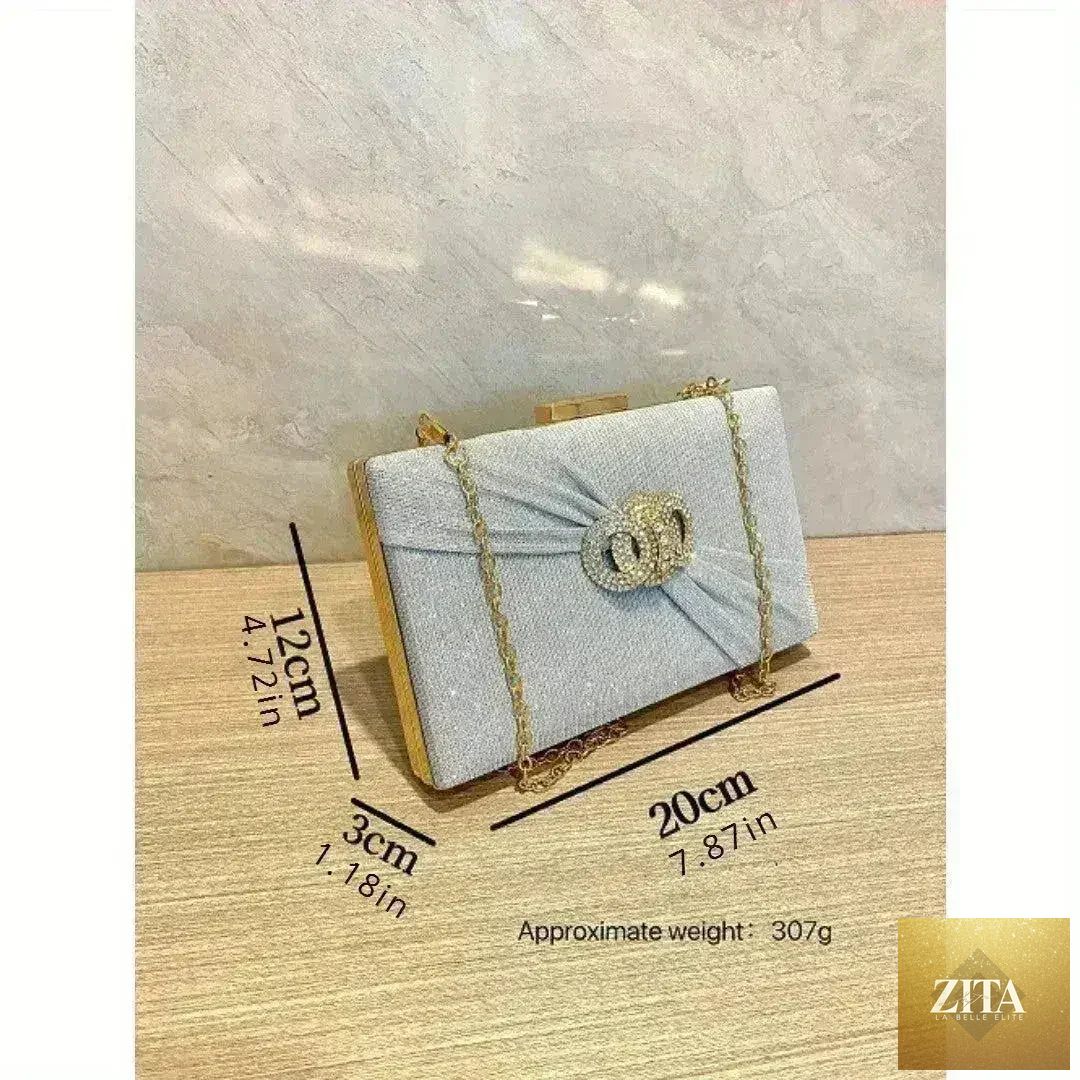 Square diamond-button clutch bag by Femstylo with a diagonal design, ideal for weddings and birthdays, featuring a stylish handbag look.