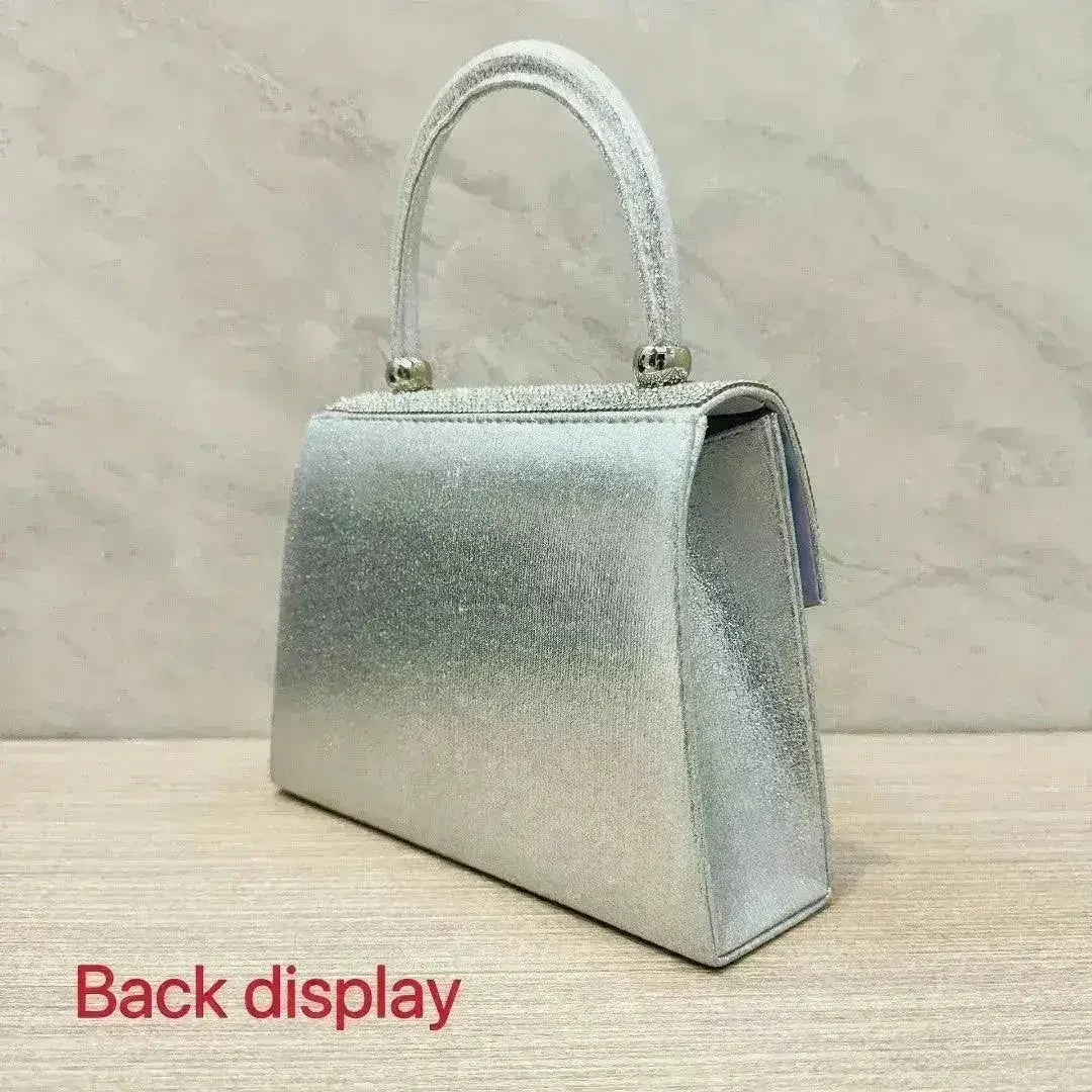 Silver rhinestone evening clutch purse by Femstylo, convertible handbag with sparkling embellishments and elegant design.