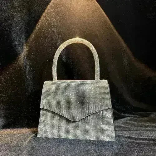 Silver rhinestone evening clutch bag by Femstylo, convertible handbag with sparkling embellishments and sleek design.