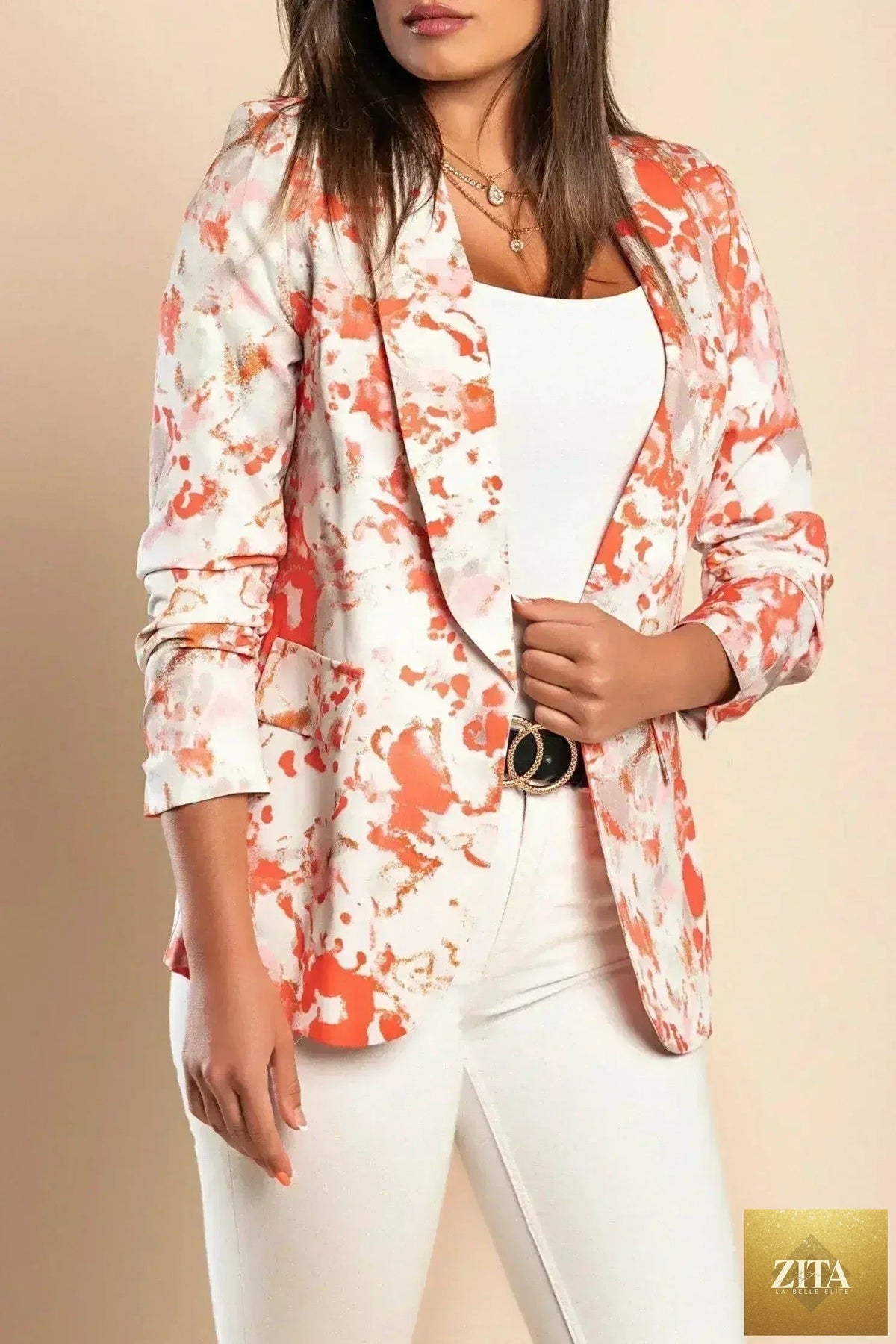 Rose pink long blazer with 3/4 sleeves from Femstylo, Italian-made women's clothing, displayed on a hanger.