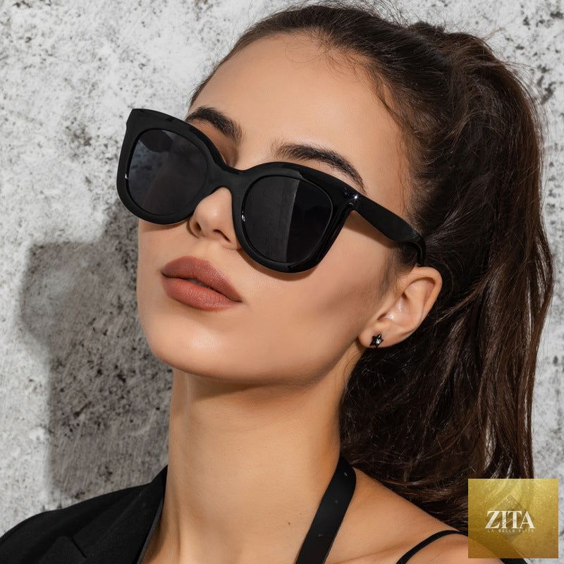 Large oversized women's sunglasses by FitiqueFit featuring bold, fashionable rimless frames for a stylish eye wear look.