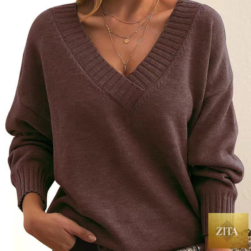 Women’s V-Neck Drop Shoulder Sweater by FitiqueFit, casual long sleeve pullover in soft knit fabric, worn relaxed fit.
