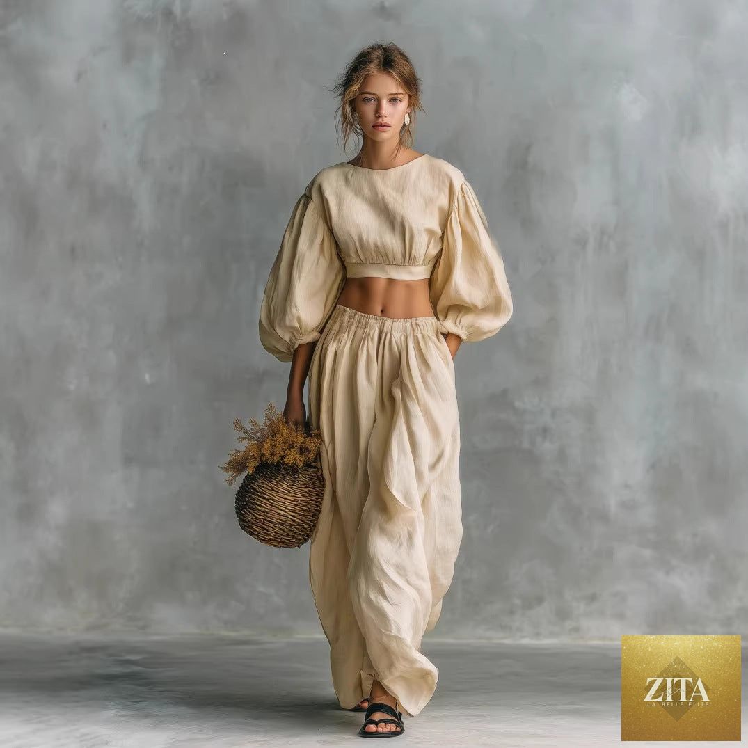 Women's puff-sleeve crew-neck two-piece casualwear set with pockets by Zita La Belle Elite, shown on a model on a neutral background.