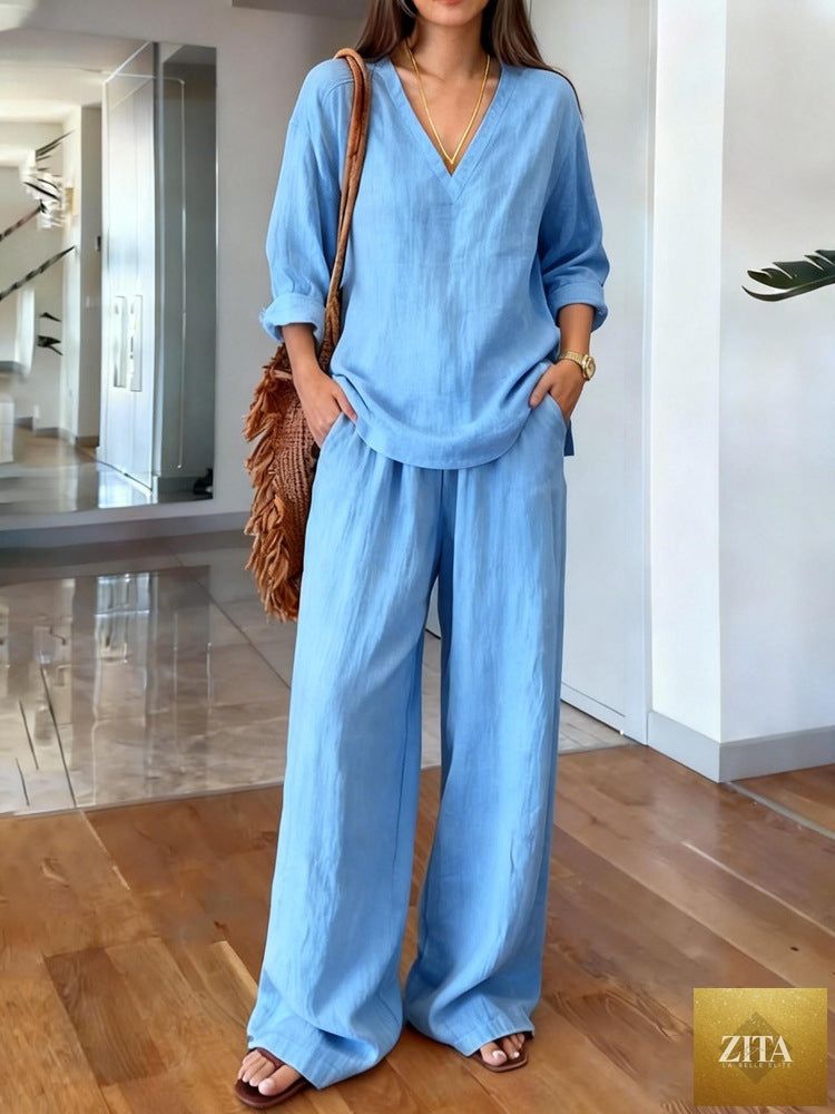 FitiqueFit long sleeve top and full-length pants two-piece set in various colors, size S to 3XL, shown in a casual indoor setting.