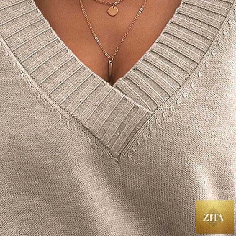 Women’s V-neck drop shoulder sweater by FitiqueFit, casual long sleeve pullover in soft knit fabric, styled for relaxed comfort.