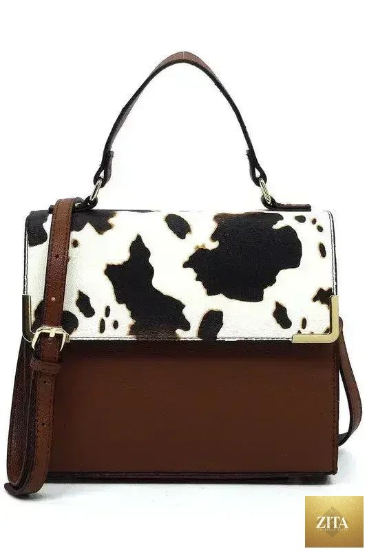 Vegan leather Femstylo satchel bag with top handle and crossbody strap, showcasing its sleek, structured design and subtle detailing.
